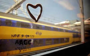 Someone said goodbye with a heart of chewing gum on the outside of the train window.